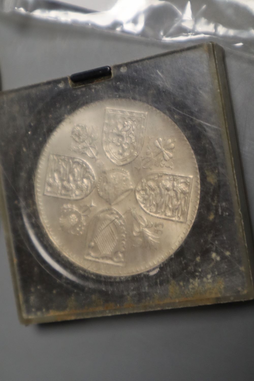 A small collection of coins, including a Tibet, Guang Xu, Szechuan, Rupee, 1902-11,